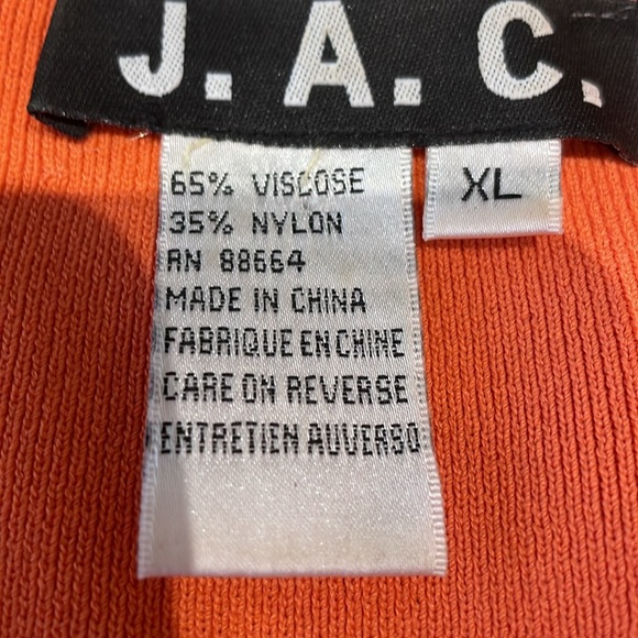 Beautiful wrap top in a striking tangerine color. - Picture 7 of 7